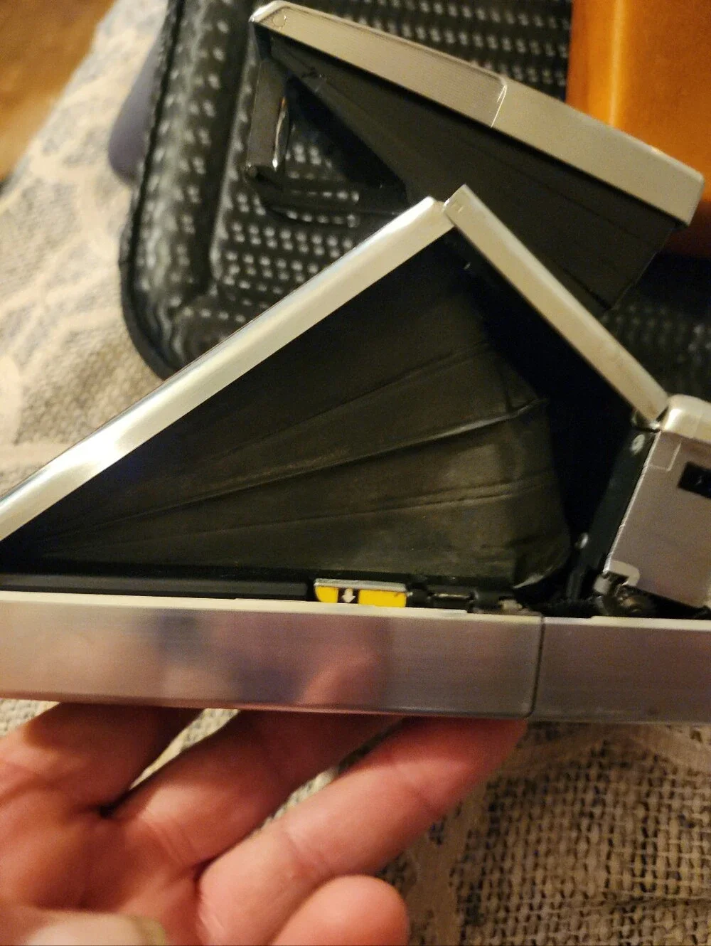 Polaroid SX-70 Land Camera in Silver with Brown and Red Accents